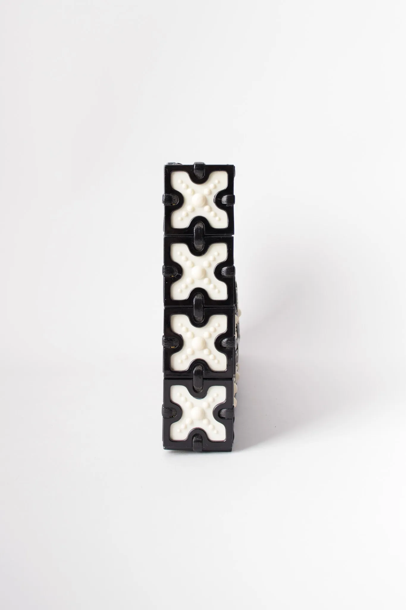 Cross Tile Clutch