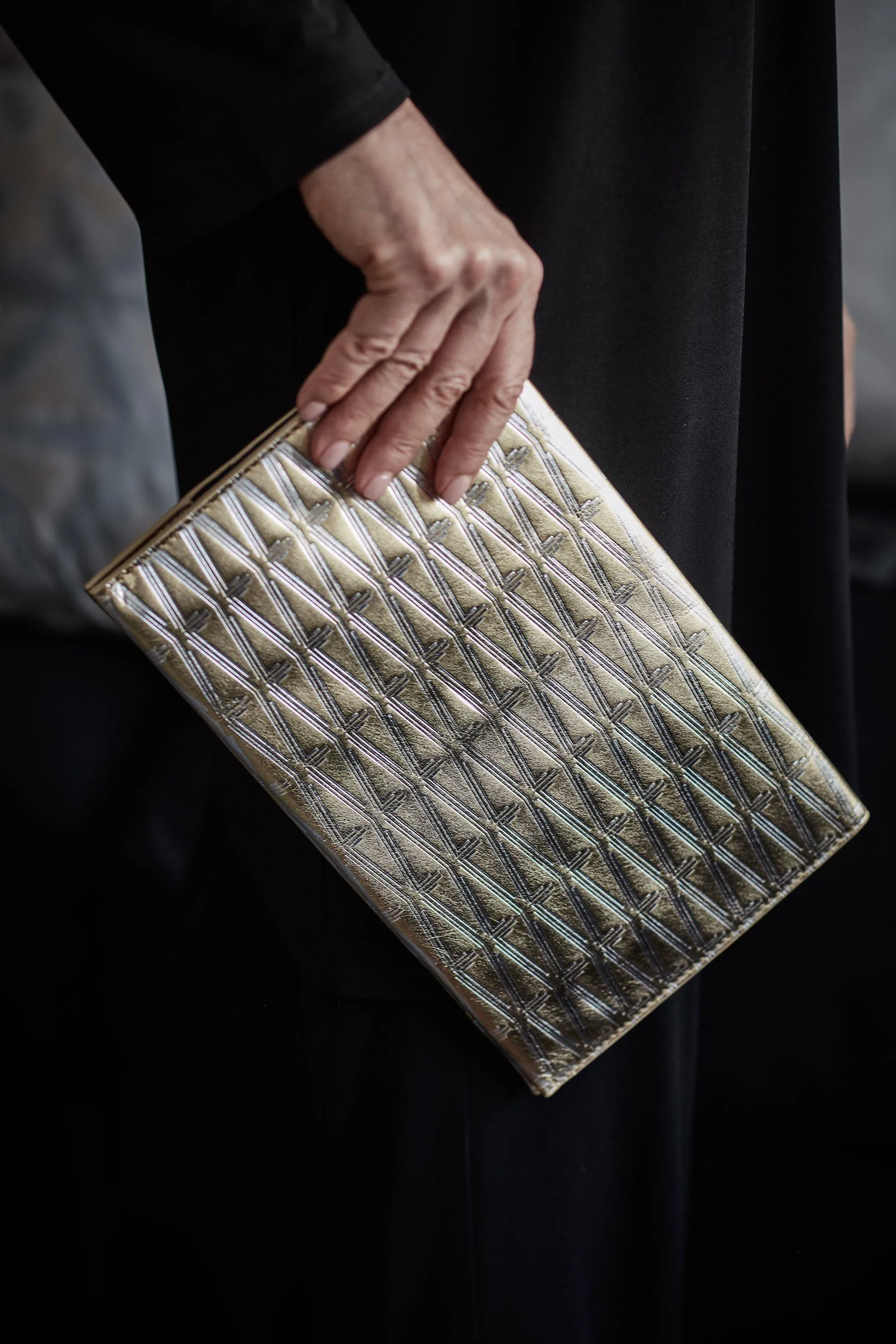 Monogram Metallic Leather Clutch