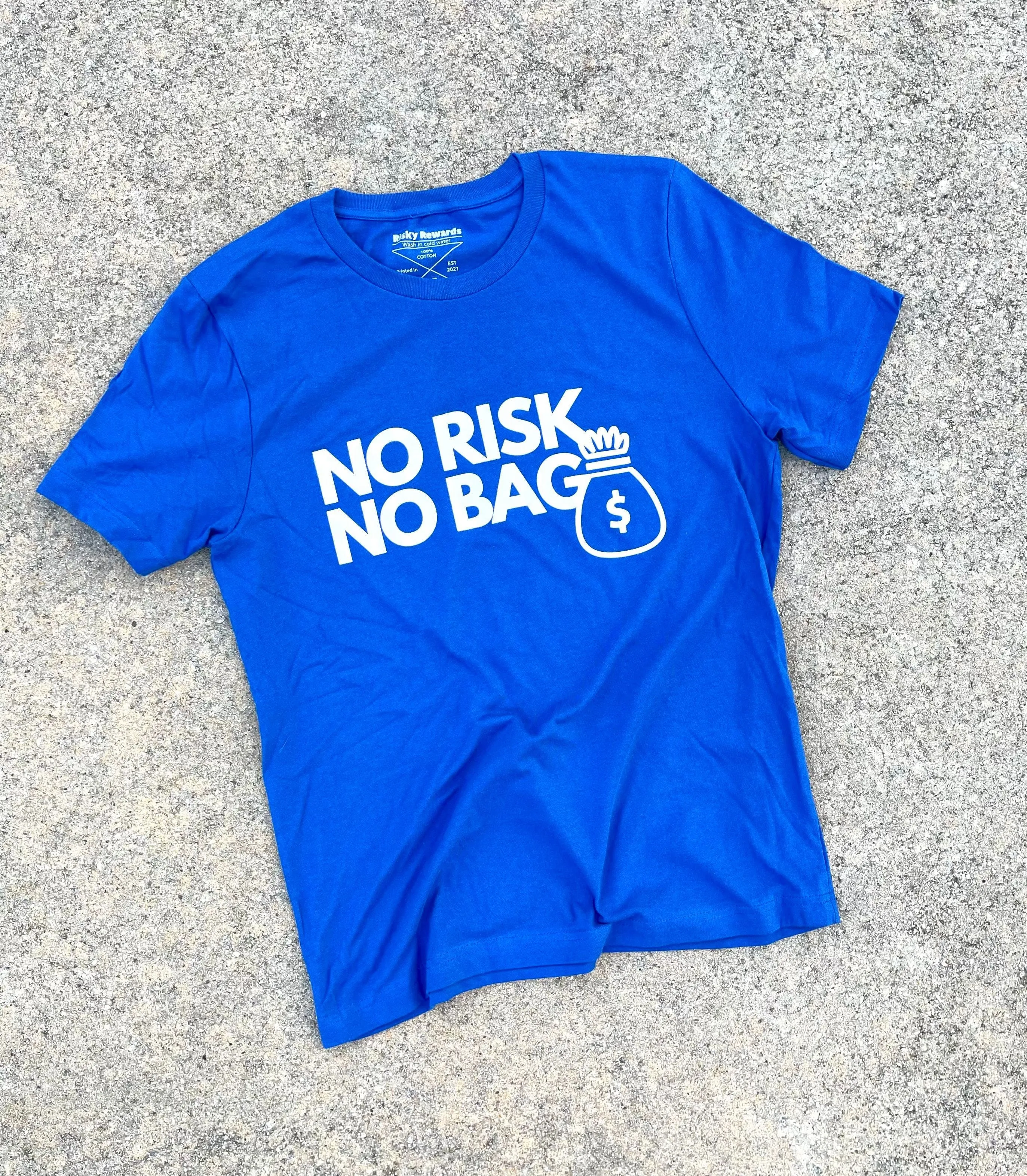 RISKY REWARDS “NO RISK NO BAG” COTTON ROYALTY BLUE TEE