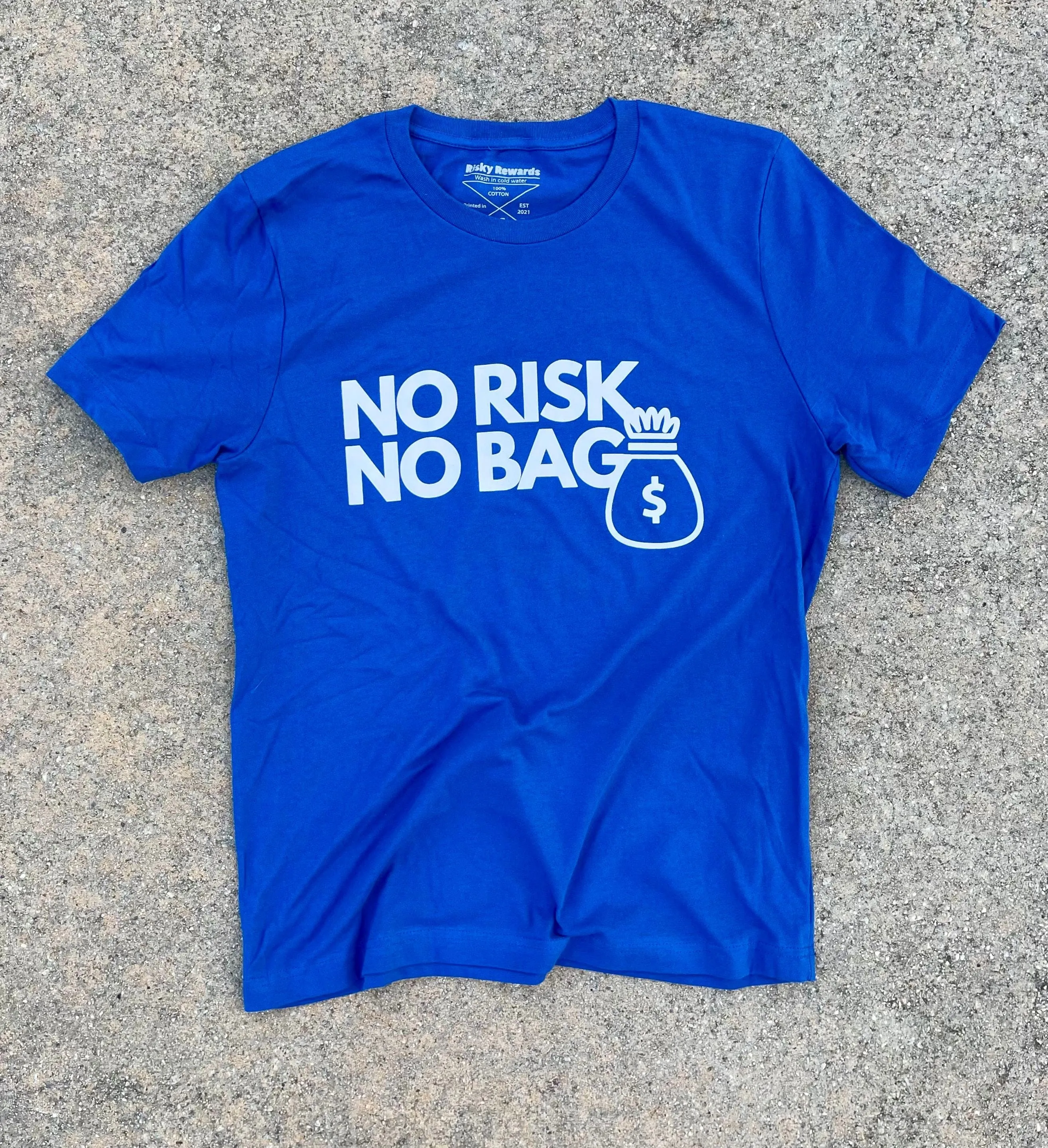 RISKY REWARDS “NO RISK NO BAG” COTTON ROYALTY BLUE TEE